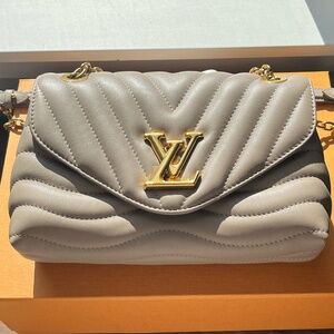 Louis Vuitton Gray Quilted Bag with Gold Accents